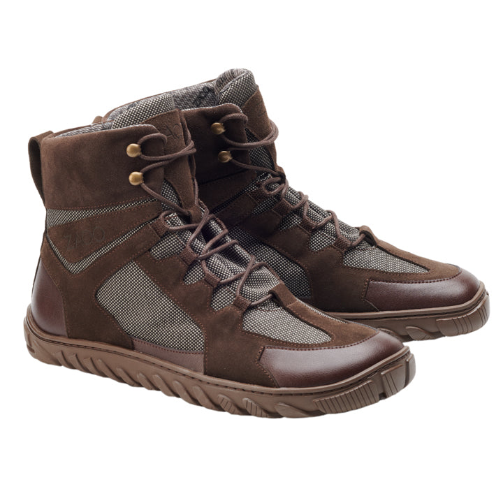 Wir präsentieren den BOSQE Waterproof Brown: Ein Paar High-Top-Wanderstiefel von ZAQQ mit Einsätzen aus braunem Wildleder und Mesh, ergänzt durch dicke Gummisohlen und rutschfeste Schnürverschlüsse für sicheren Halt auf jedem Gelände.